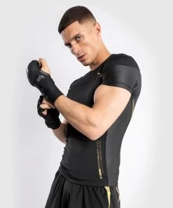 Venum Tempest 2.0 Rashguard - Short Sleeves - MMA Factory -Boxing Equipment Store 99e6578e2a4119fae29069887ba1f3fd9f092947 rashguards ss tempest2.0 black gold 01 1
