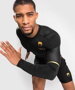 Venum Tempest 2.0 Rashguard - Long Sleeves - MMA Factory 24 Venum Tempest 2.0 Rashguard - Long Sleeves - MMA Factory -Boxing Equipment Store venum tempest 2.0 rashguard long sleeves black gold 1 1